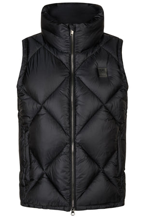 L'image montre un gilet matelassé de couleur noire. Voici une description détaillée de ses caractéristiques : 1. **Design** : - Le gilet présente un motif matelassé en losanges, créant un aspect à la fois moderne et élégant. - Les coutures des losanges sont bien définies, donnant une apparence structurée. 2. **Fermeture** : - Il est équipé d'une fermeture éclair centrale qui s'étend de la base jusqu'au col, facilitant l'enfilage et le retrait. - La fermeture éclair est de...