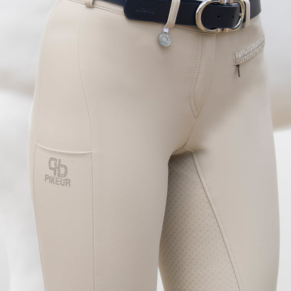 Culotte d'équitation dame Pikeur Vally grip coloris crème détail poche portable avec strass| et devant | Sellerie Bucéphale