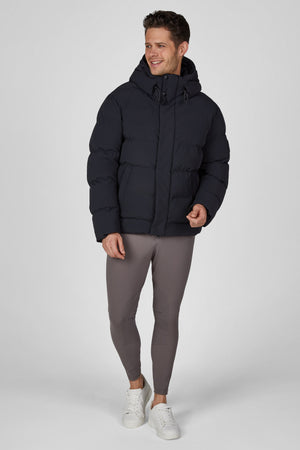 Veste matelassée homme Pikeur, coloris noir, porté vue de face
