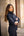 IT04076_lifestyle_celinesoftshelljacket_navy_6